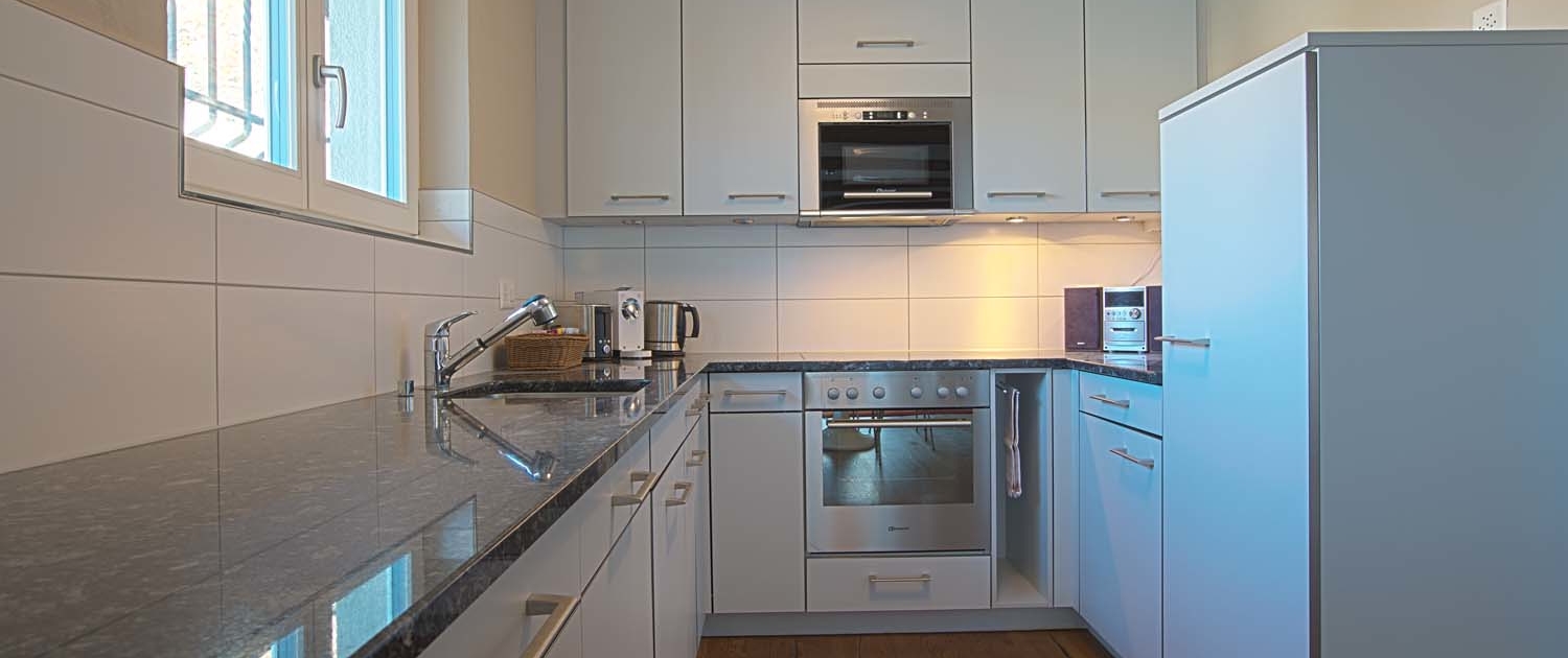 Voll ausgestatette Küche im Riverhouse Ferienhaus des Hotel Bellevue Interlaken