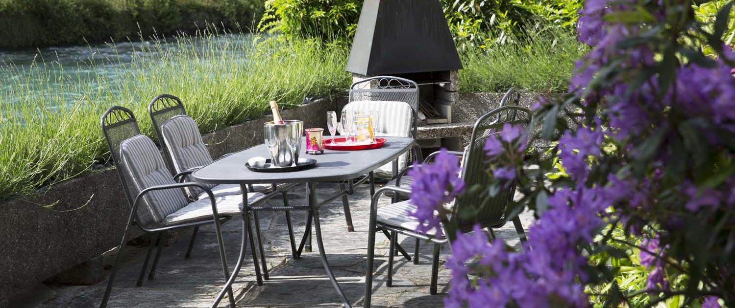 Terrace with barbecue grill in the holiday cottage of Hotel Bellevue in Interlaken Switzerland