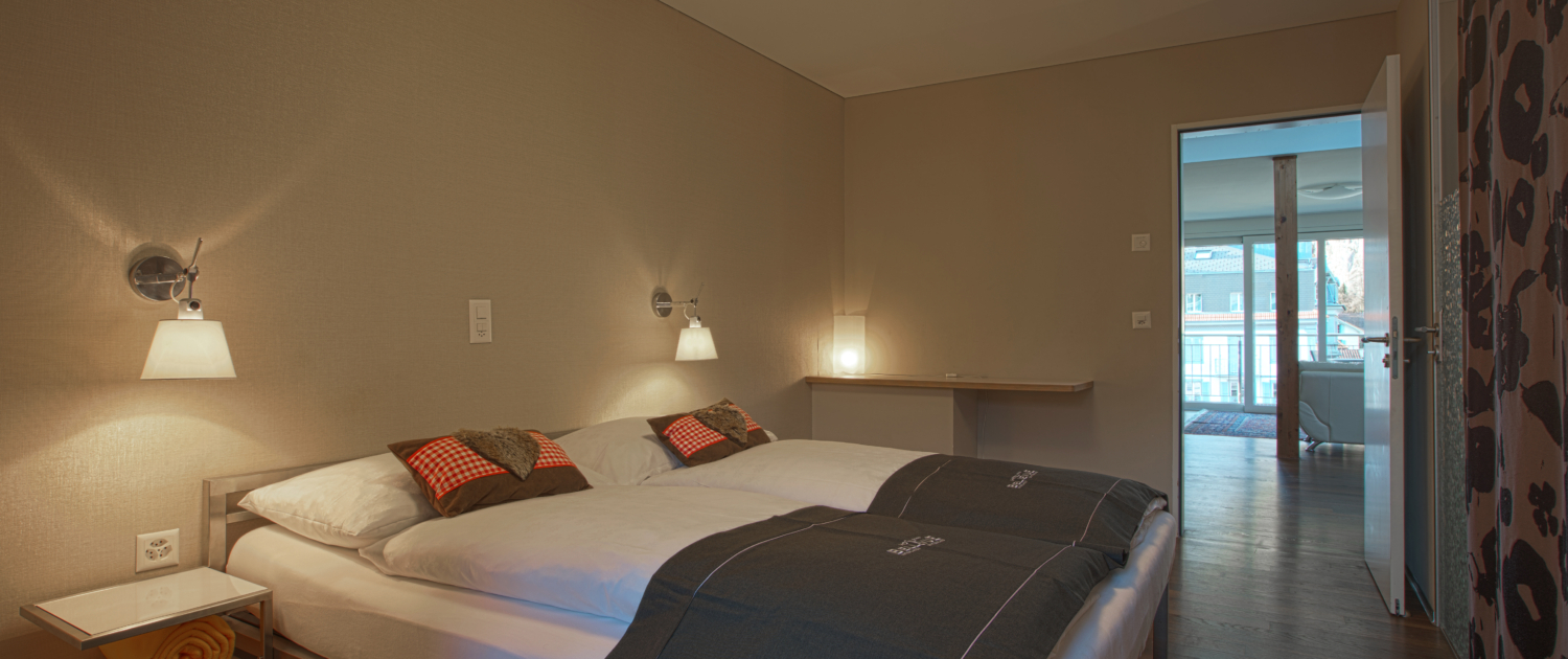 Boutique-Hotel-Bellevue-Interlaken-Apartment-8 Sleeping room Bellevue Apartment